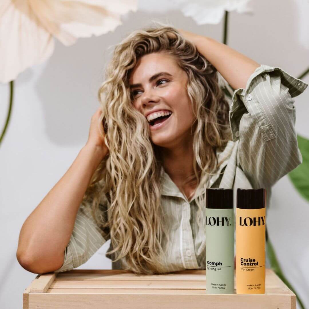 Blonde wavy curly hair girl with curl cream and curl hydration gel